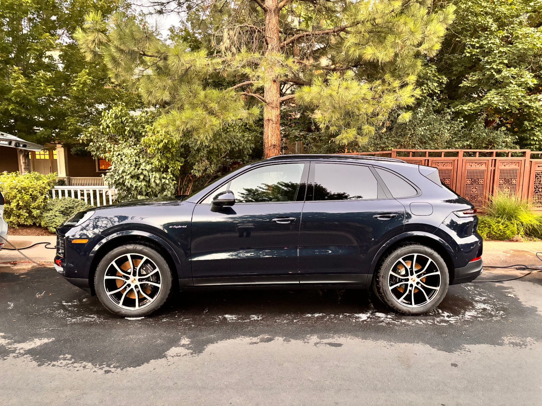 Freshly detailed Porsche Cayenne in a Boulder driveway